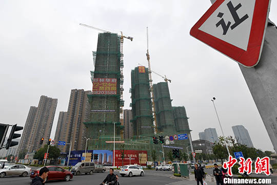 資料圖：一處在建中的商品房。 <a target='_blank' href='http://www.chinanews.com/'>中新社</a>記者 呂明 攝